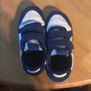 Puma white, green, and blue tennis shoes